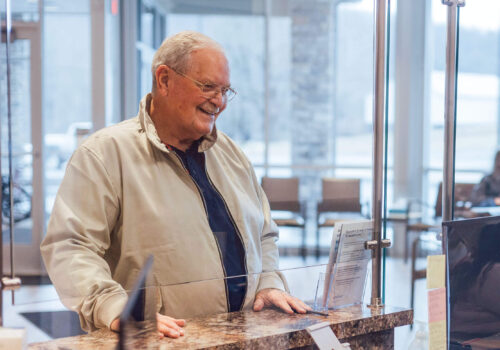 Patient checking in to Myers Clinic