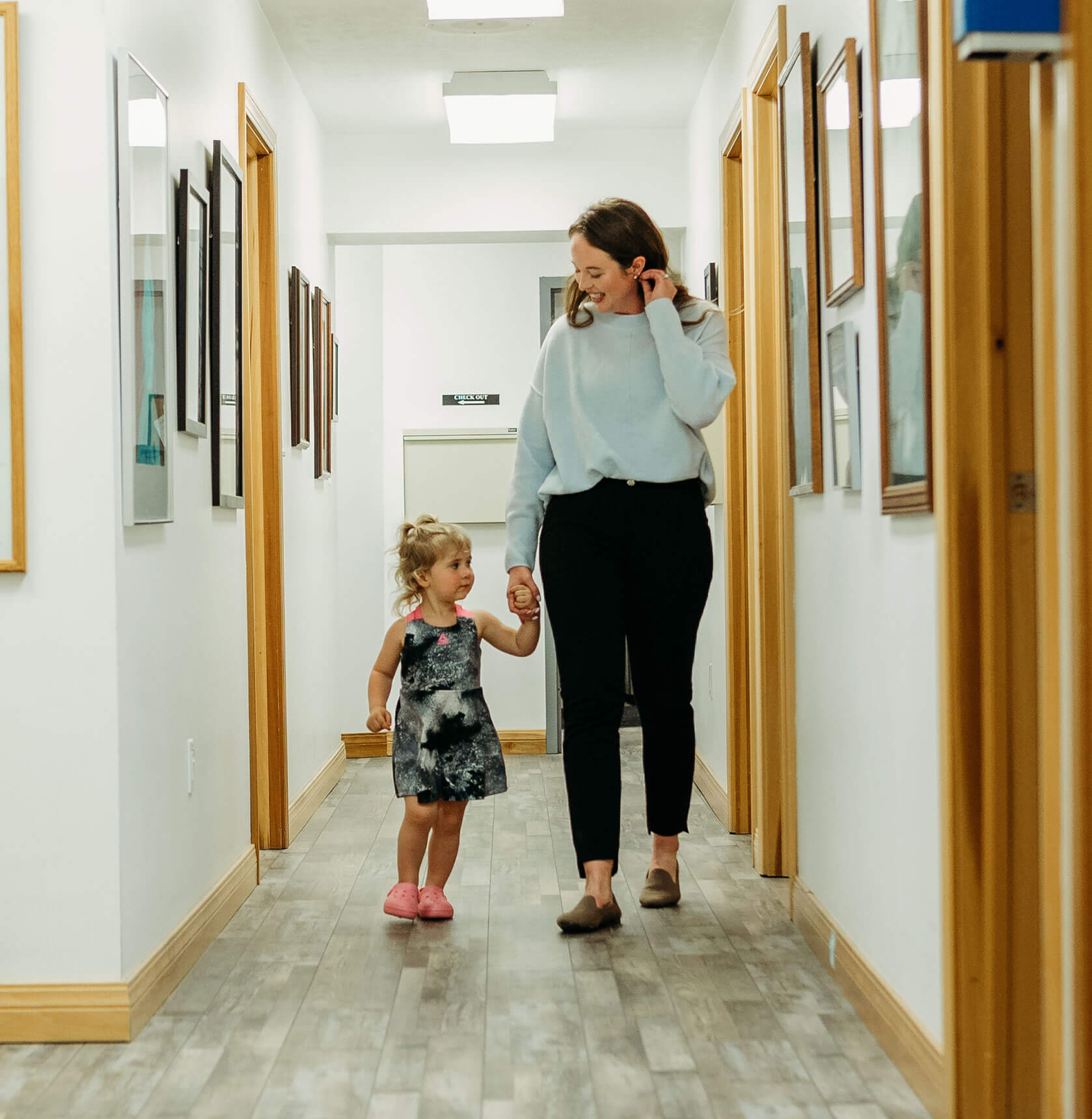 Pediatric patient walking in a hallway